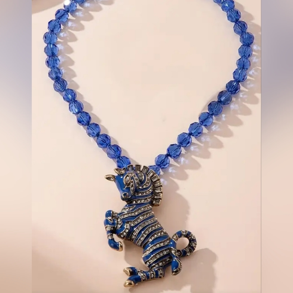 Blue Beaded Necklace with Zebra Pendant
